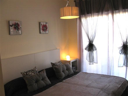 Auch das zweite Schlafzimmer hat einen Ausgang zur Terrasse